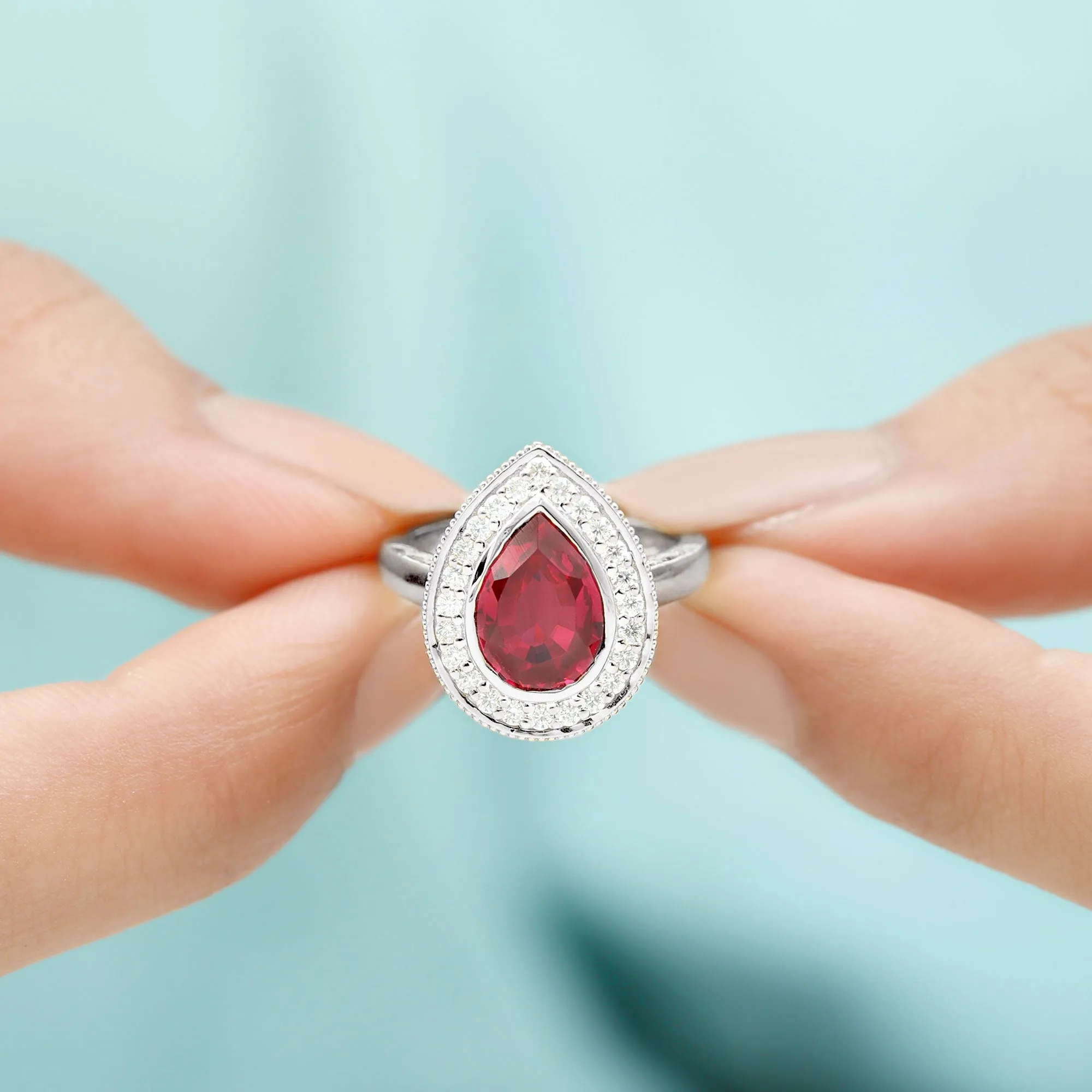 2 CT Pear Cut Created Ruby Solitaire Engagement Ring with Diamond Halo