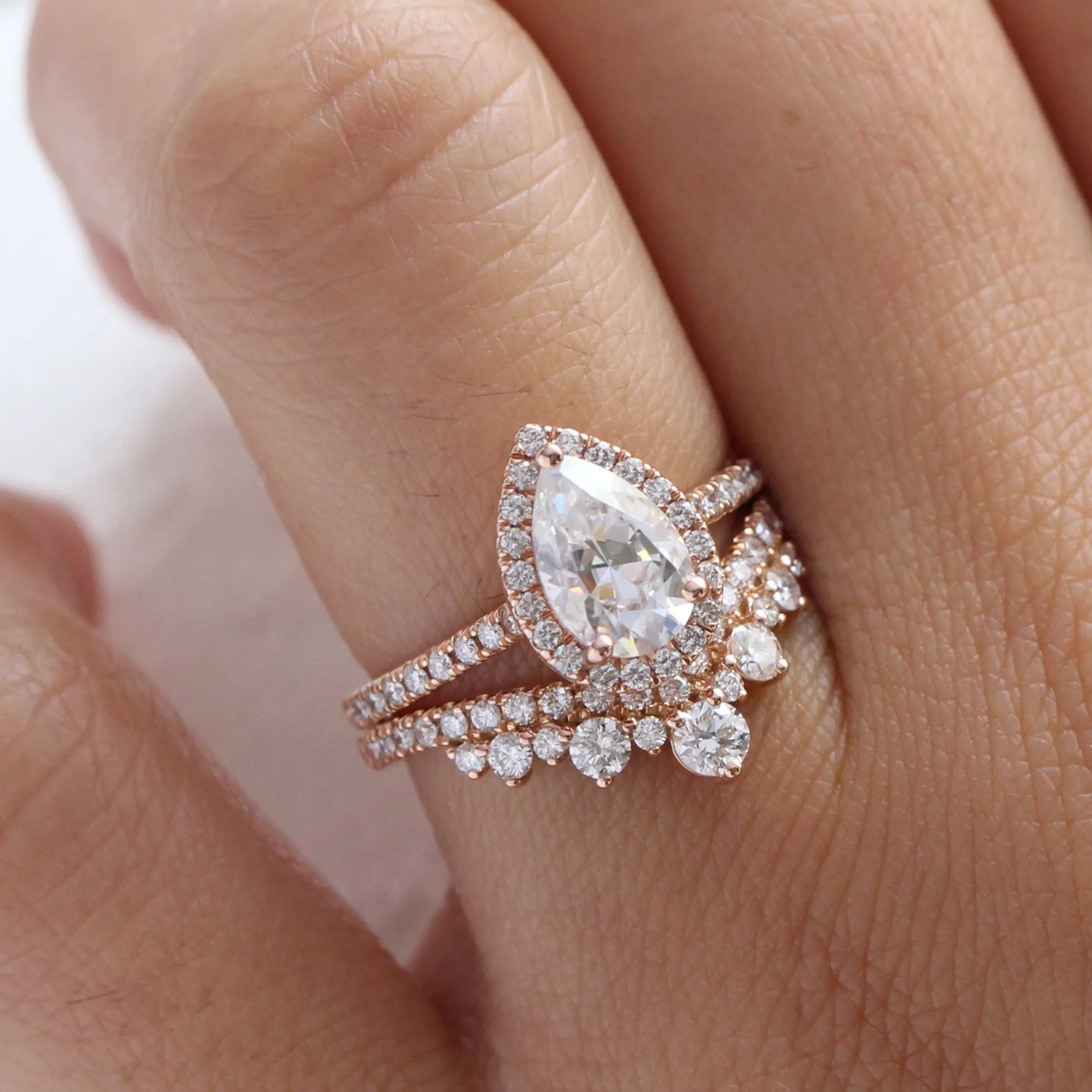 Pear Moissanite Engagement Ring in Luna Halo Diamond Pave Band