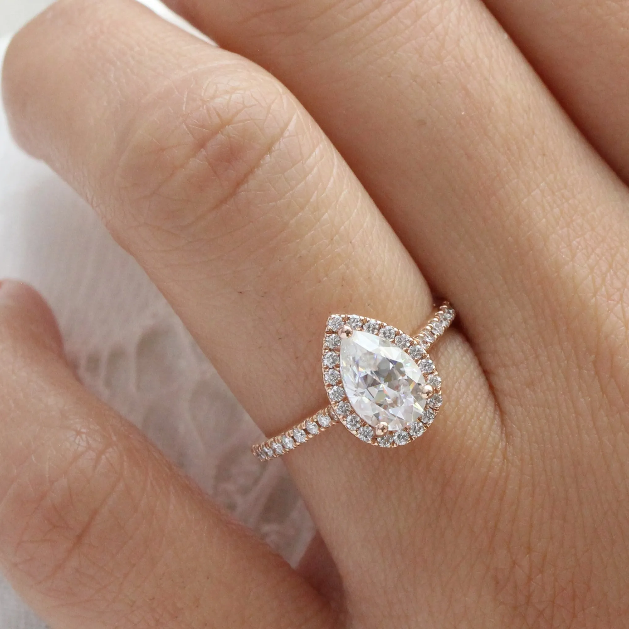 Pear Moissanite Engagement Ring in Luna Halo Diamond Pave Band