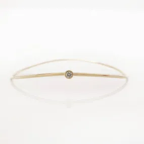 “Wave” Bangle with diamond in solid gold